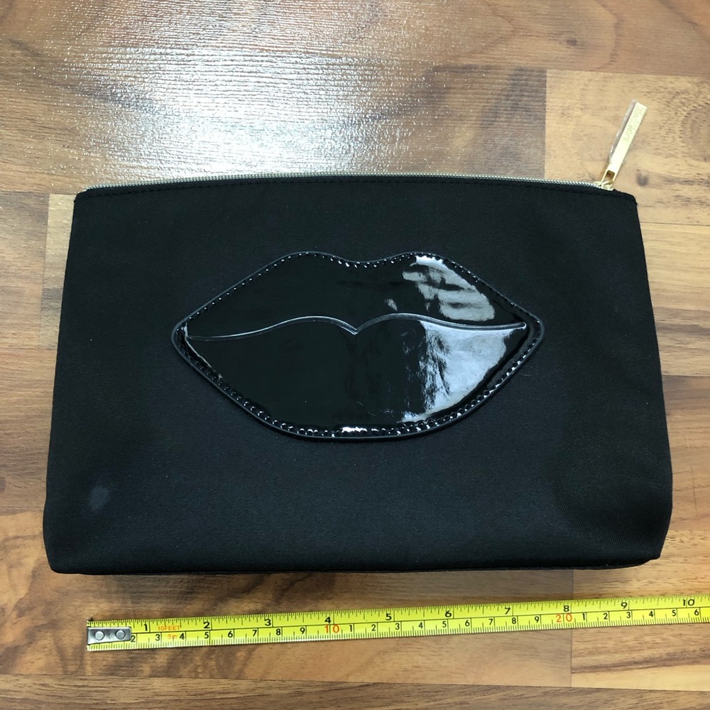 Lancôme black lips makeup bag